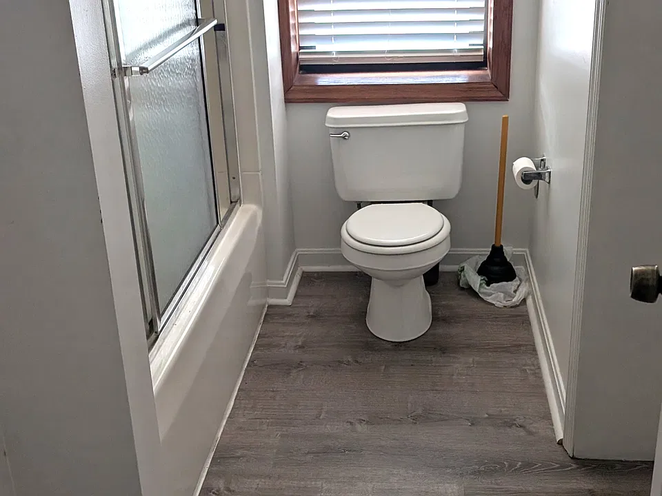 Shared bathroom connecting with bedroom and hall
