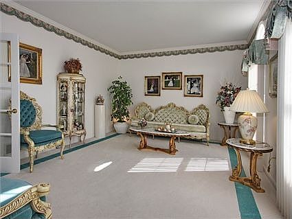 Formal living room provides lots of sunlight