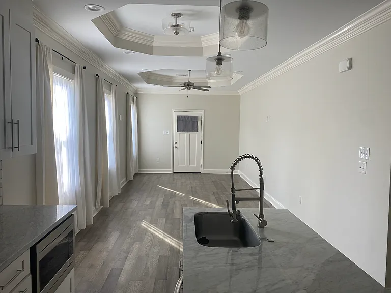 View of the front door from the kitchen