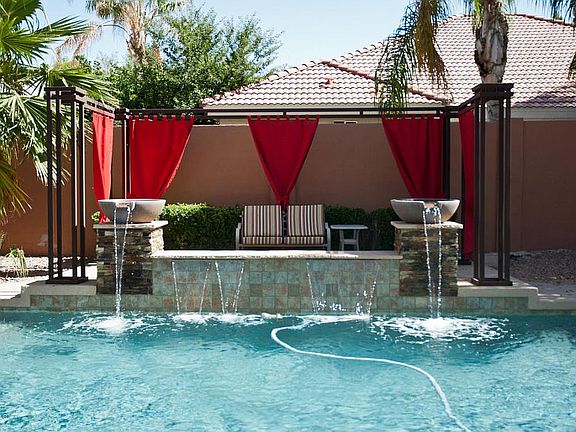 Pool with waterfall feature 