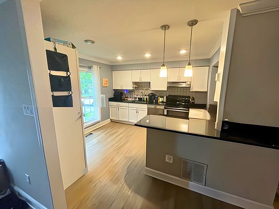 View of kitchen from foyer