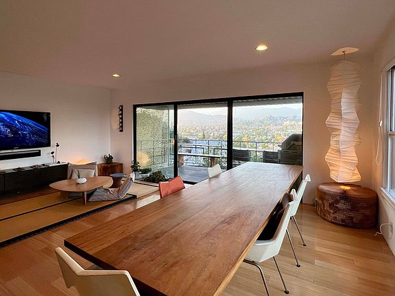 Mahogany dining table / Apple TV with Netflix