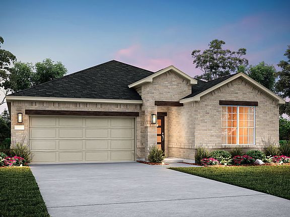 The Orchard, a one-story home with 2-car garage, shown with Home Exterior 32