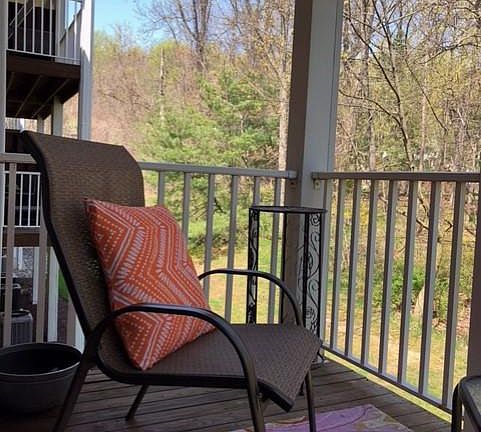 Sliding Doors to Balcony off Dining Room w/View of Wooded Area