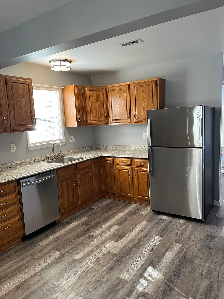 Kitchen has ample cabinet storage space, dishwasher and new refrigerator. - 2513 S Marine Ave