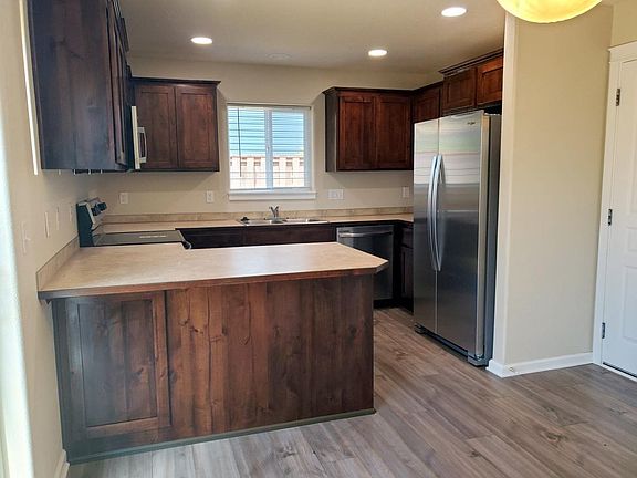 Kitchen, the door to right leads to a 2 car garage.
