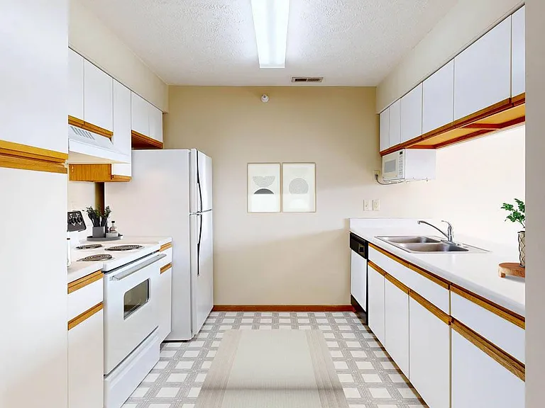 Spacious galley kitchens offer plenty of countertop space and open sightlines into your living area perfect for prepping, cooking, and staying connected.