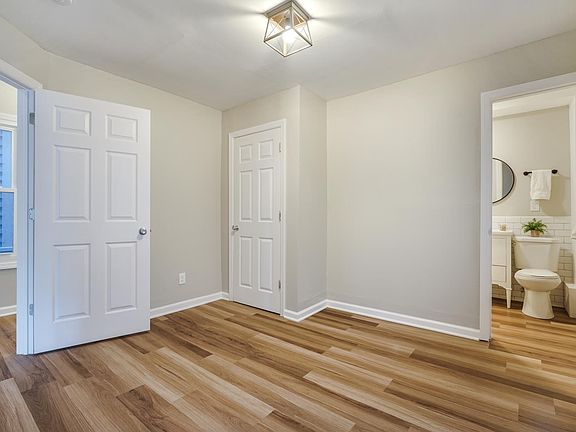 First floor bedroom with entrance to first floor bathroom