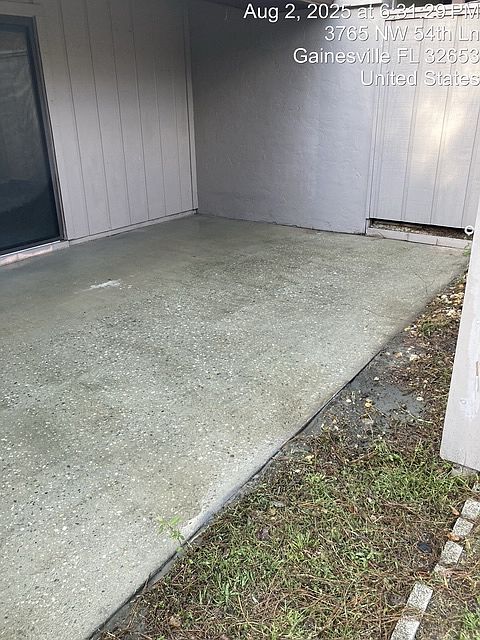 Part of back patio, partially covered