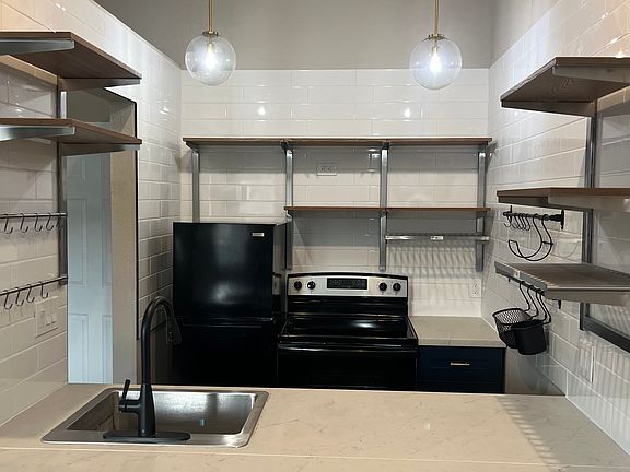 This kitchen is all new and is beautiful.