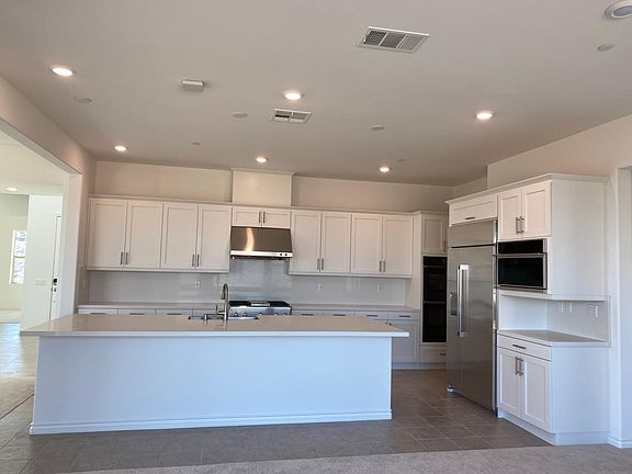 Large kitchen with large counterspace and shelf space