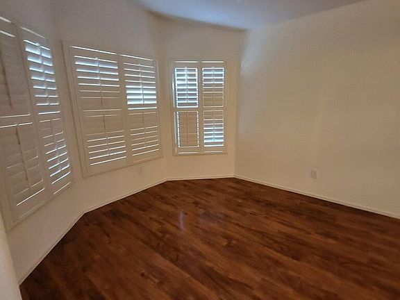 Living Room Bay Window (Plantation Shutters)