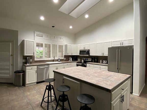 LARGE kitchen accomodates several dining areas