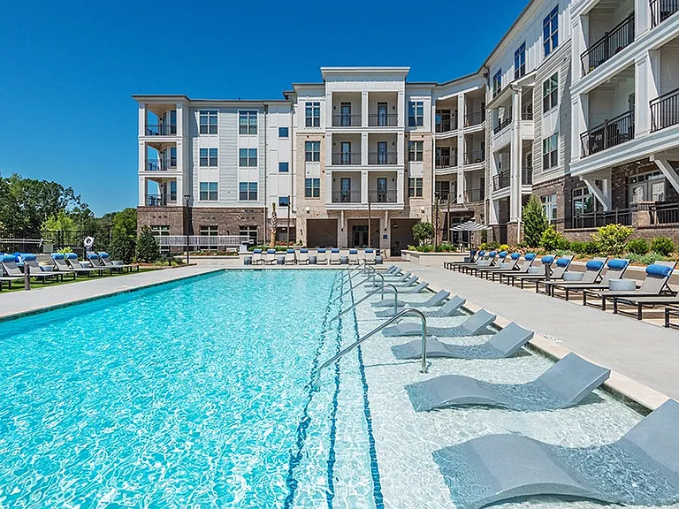 Relax on the sun shelf of our resort-style saltwater pool