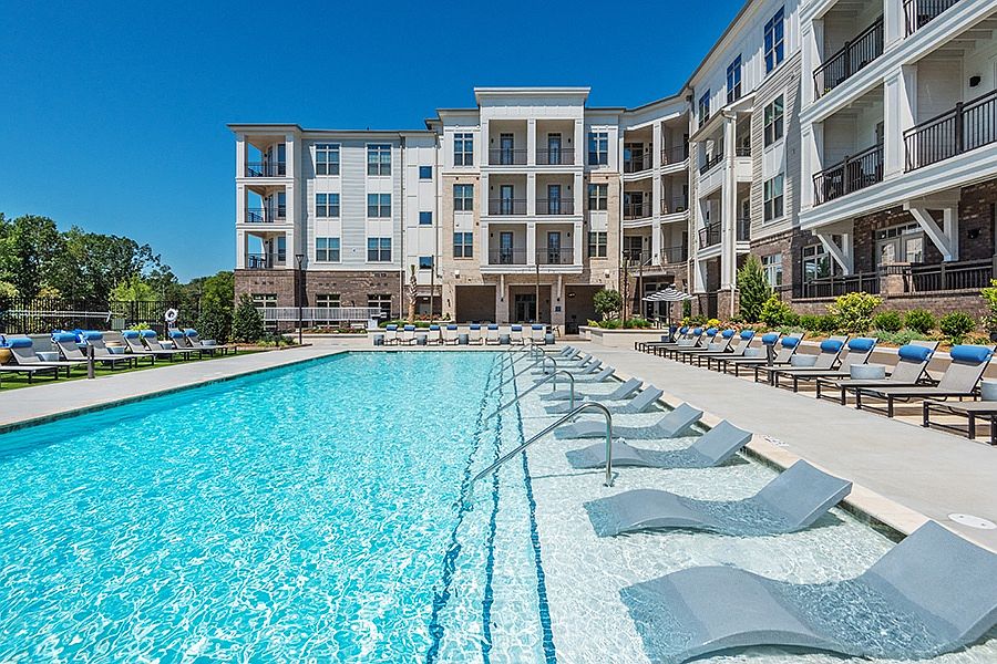 Relax on the sun shelf of our resort-style saltwater pool