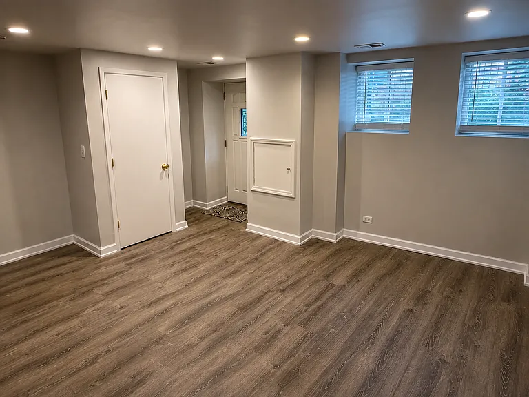 Entry and living room with coat closet
