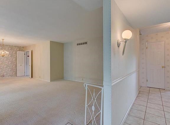 Entrance foyer opens to living/dining room