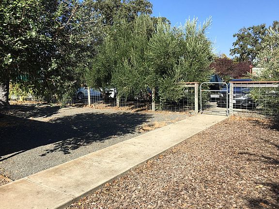 Gated entrance to front yard from designated parking spot.