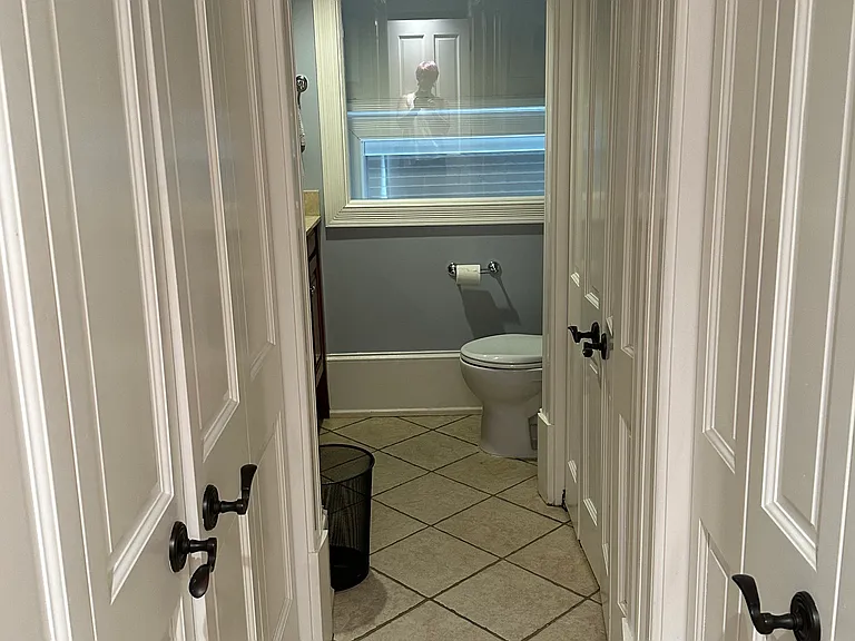 Storage closets in 2nd floor bathroom.