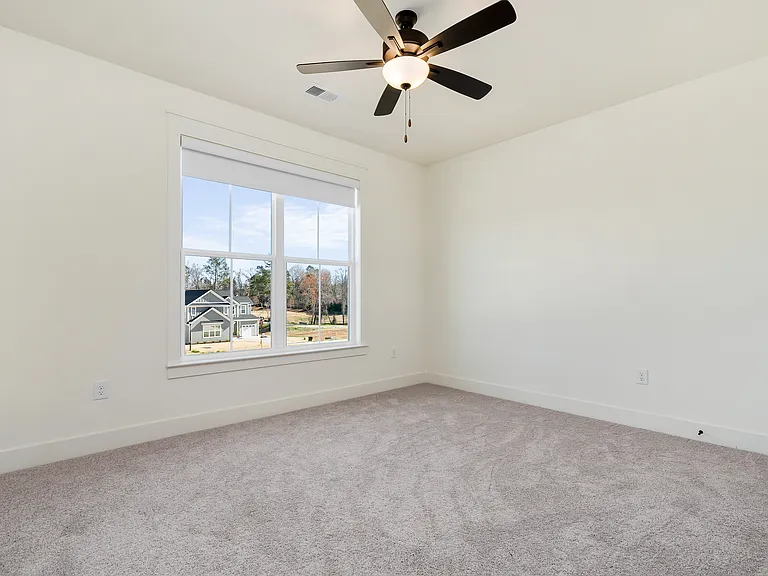 Second guest bedroom located at the foremost part of the home share a full bath. Comes with black-out pull-down blind.