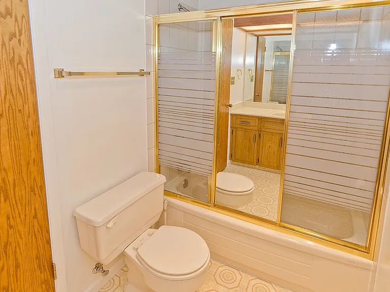 740 Coach Bluff Cres SW — Photo 28