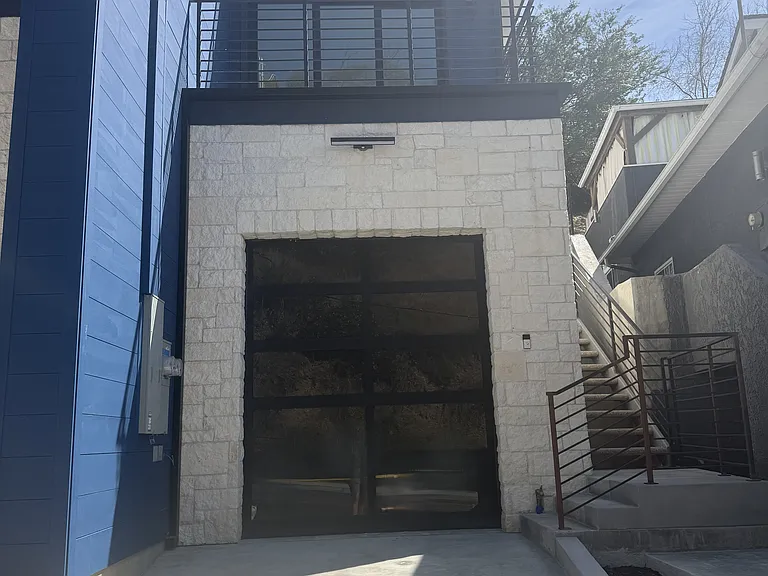 Large, single car garage with parking in driveway and plenty of street parking available