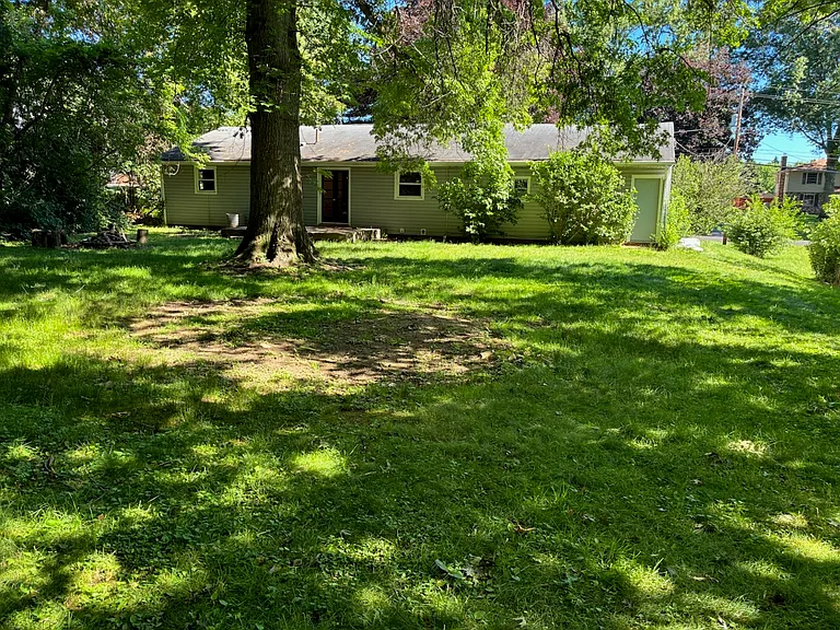 Huge yard. Beautiful shaded oasis.