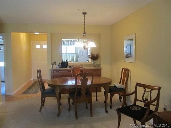 VIEW OF FOYER AND GARAGE AC...