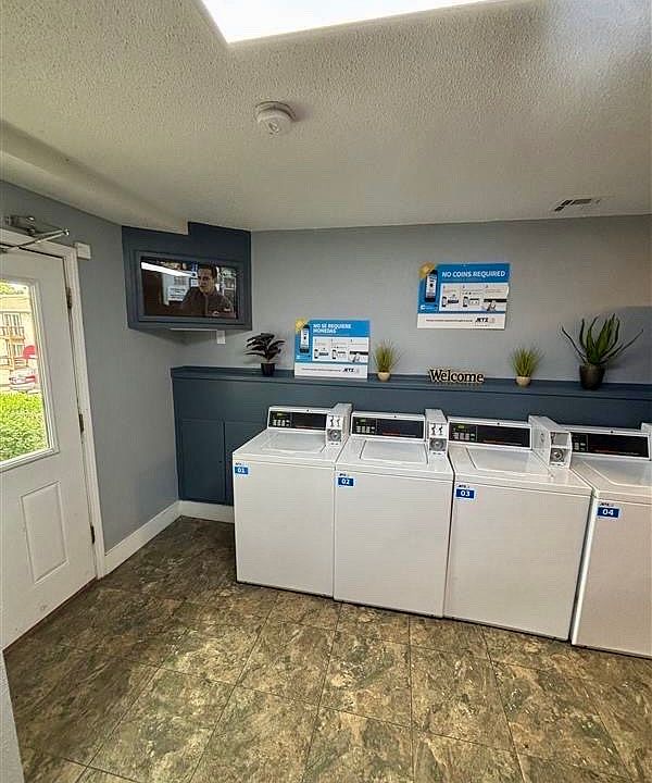 Laundry room with vending machines.