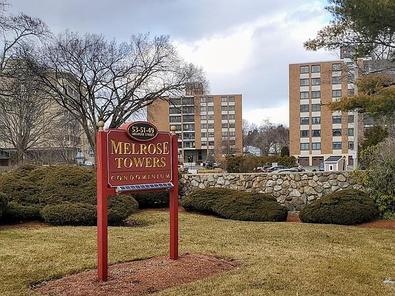Entrance to Melrose Towers, a three-building complex, each seven stories high.