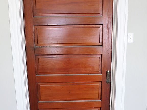 Pocket door between bedroom 1 and living room