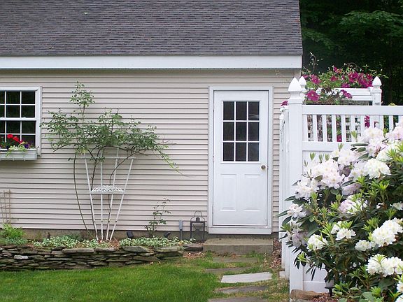 Charming Yard View of Garage