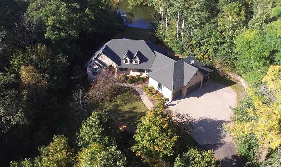 Amazing 2.6 acre lot! Beautiful mature trees and backed to Potters Lake.