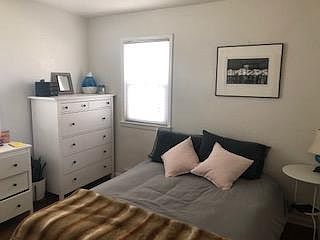 Larger bedroom, South and west windows