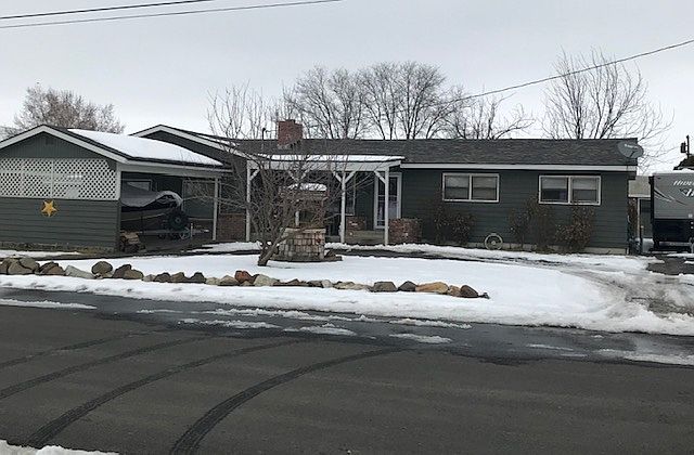 Front yard w/ carport