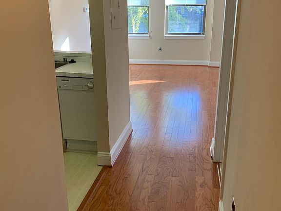 As you enter the apartment, the bathroom is on the right, the kitchen on the left.