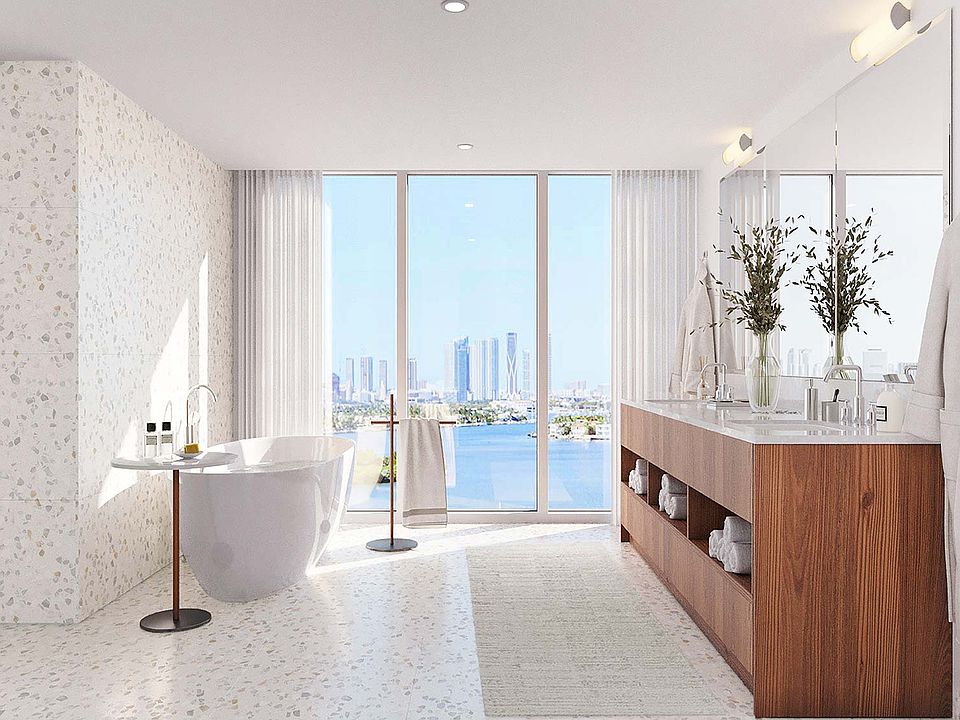 Select homes feature soaking tubs and expansive vista views of the water.