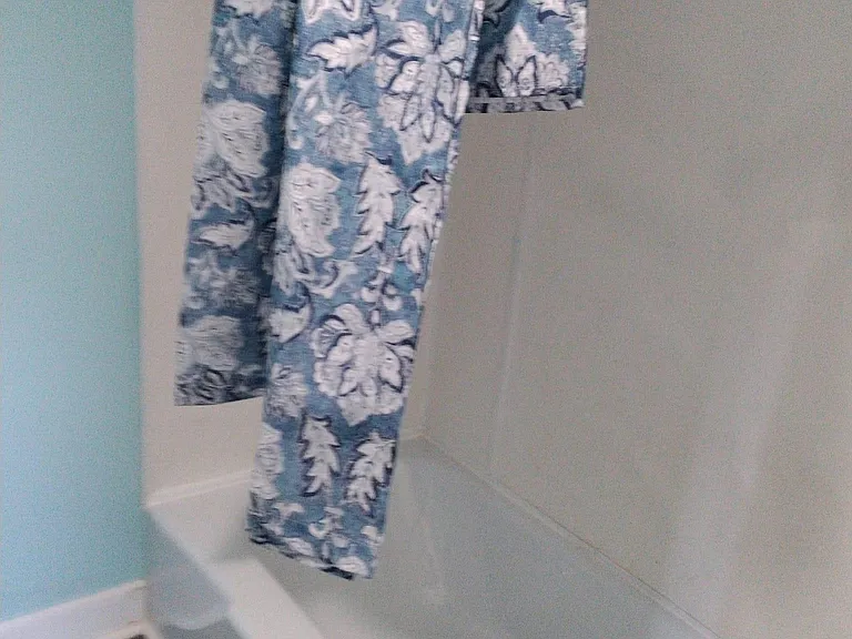 Bathtub with slanted ceiling