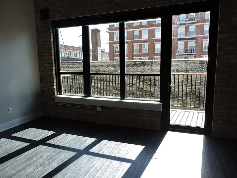 Living Room of #203 and Balcony - South Facing