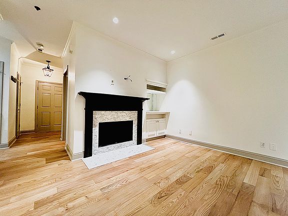 Spacious living space with gas fireplace