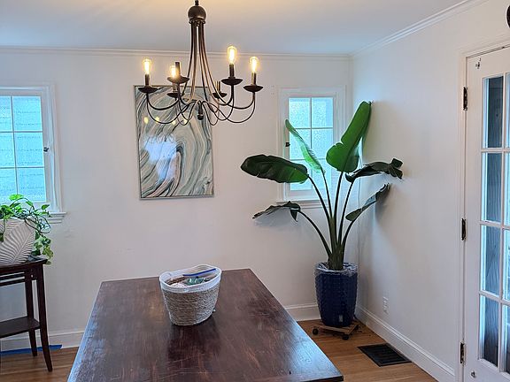 FORMAL DINING ROOM WITH ACCESS TO BACKYARD VIA FRENCH DOOR