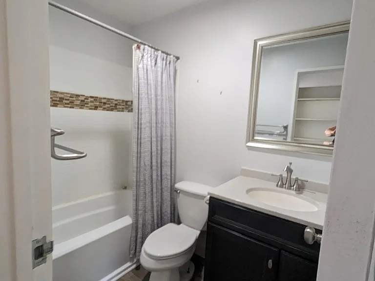 Upstairs full bath serves guests or 2nd bedroom - updated from floor to fixtures!