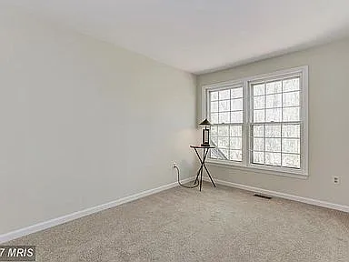 Bedroom 1 facing backyard.