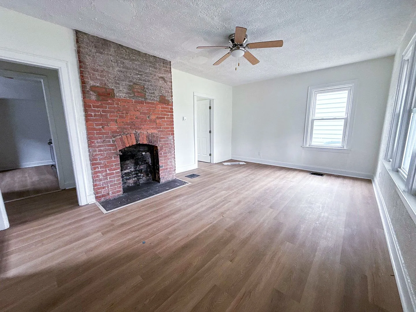 Newly Rehabbed 4BR Home w/ Front Porch, Back Deck & Full Basement — Photo 3