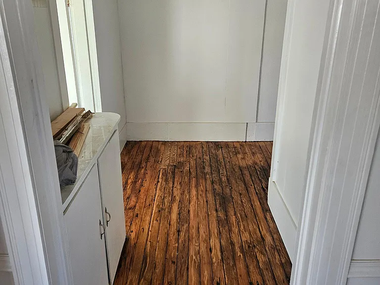 Hallway leading to Bathroom and Kitchen