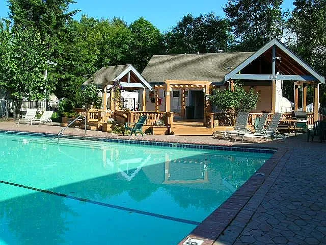 Key-controlled Pool area with Hot-tub, change rooms, and BBQ picnic area.