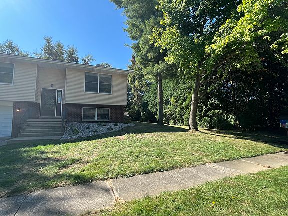 New landscaping; lawn being repaired with ongoing lawn service/mowing/weeding included