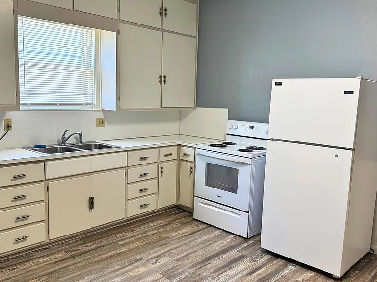 Large open kitchen with lots of cabinetry