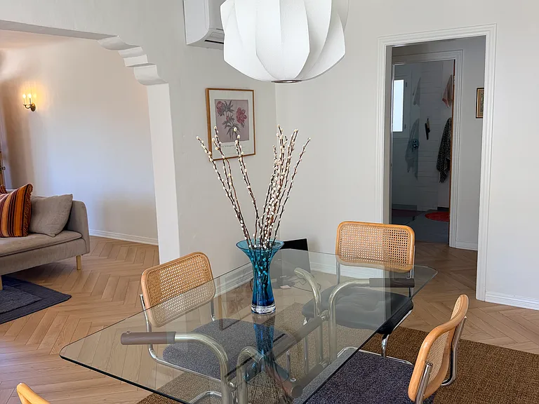hall entry to bedrooms and bathroom off dining room
