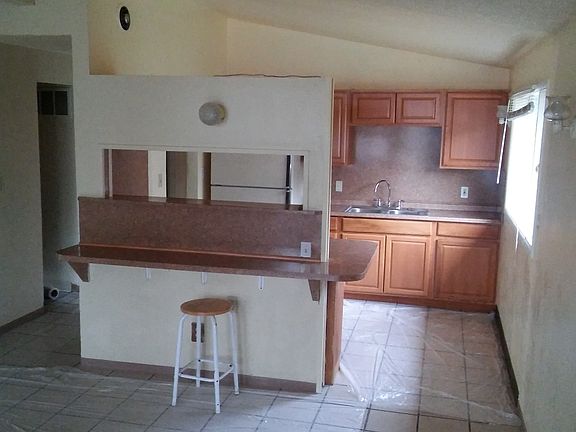 wrap around media center to kitchen